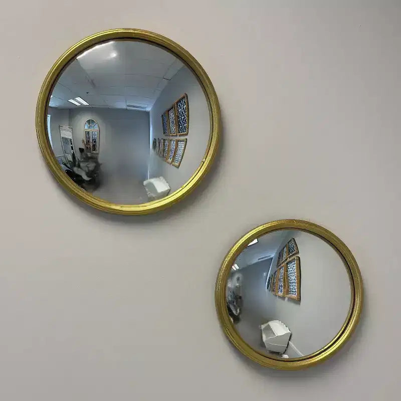 Miroir convexe doré avec cadre en métal, accent mural décoratif pour salon ou entrée, petite ou moyenne taille
