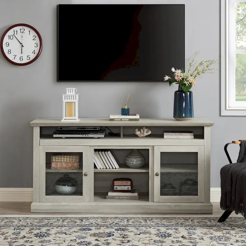 Meuble TV gris pierre 60 avec gestion des câbles, portes en verre et étagères réglables pour téléviseurs jusqu'à 65