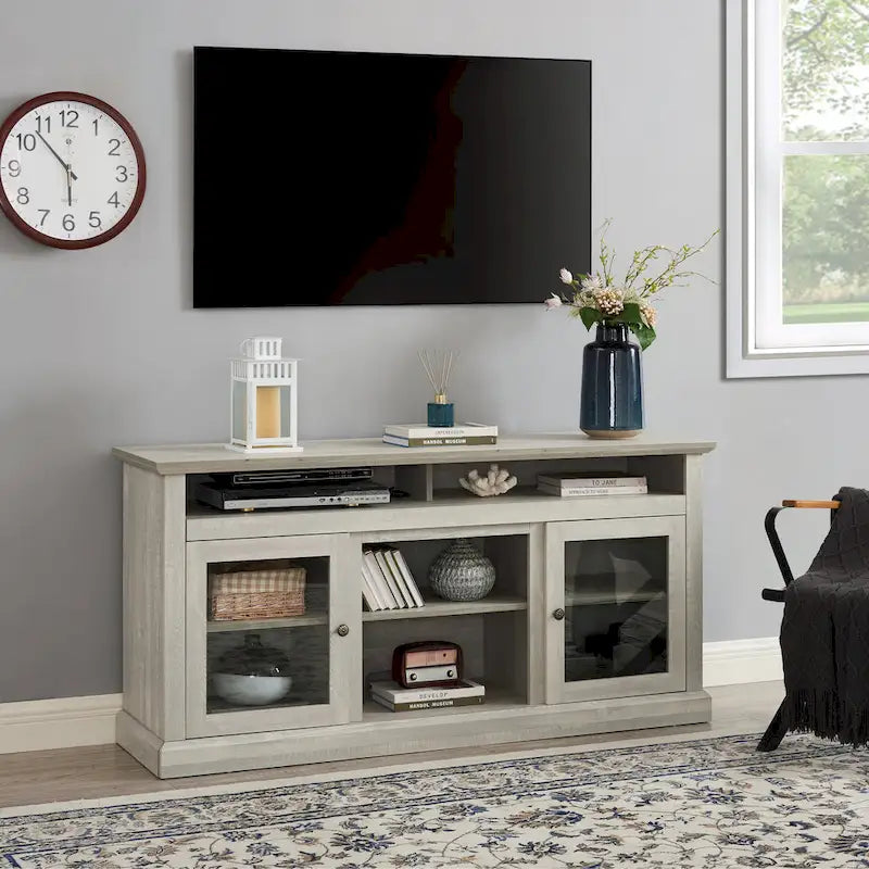 Meuble TV gris pierre 60 avec gestion des câbles, portes en verre et étagères réglables pour téléviseurs jusqu'à 65