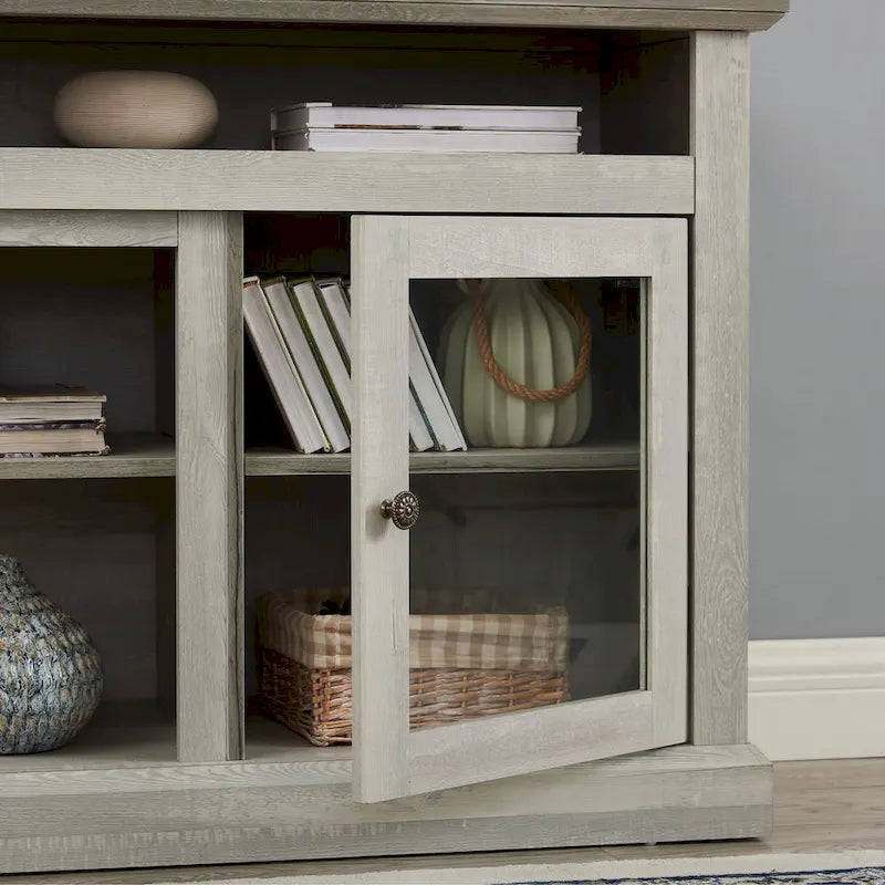 Meuble TV gris pierre 60 avec gestion des câbles, portes en verre et étagères réglables pour téléviseurs jusqu'à 65