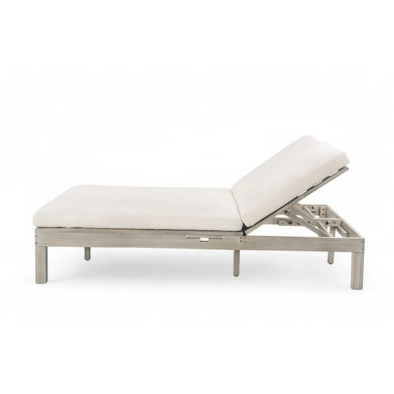Chaise longue d'extérieur avec coussin et plateaux latéraux pliants