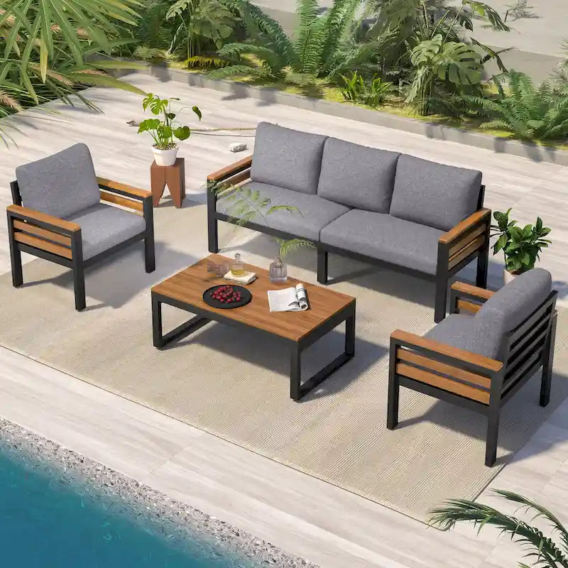 Ensemble de canapé d'extérieur en fer 4 pièces avec table basse en bois et coussins