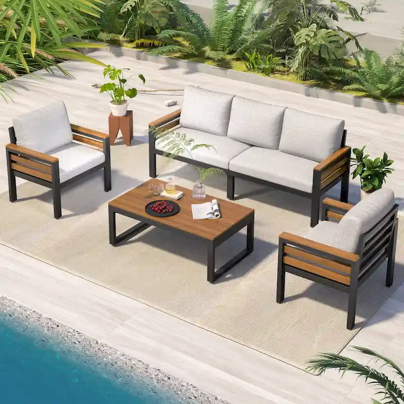 Ensemble de canapé d'extérieur en fer 4 pièces avec table basse en bois et coussins