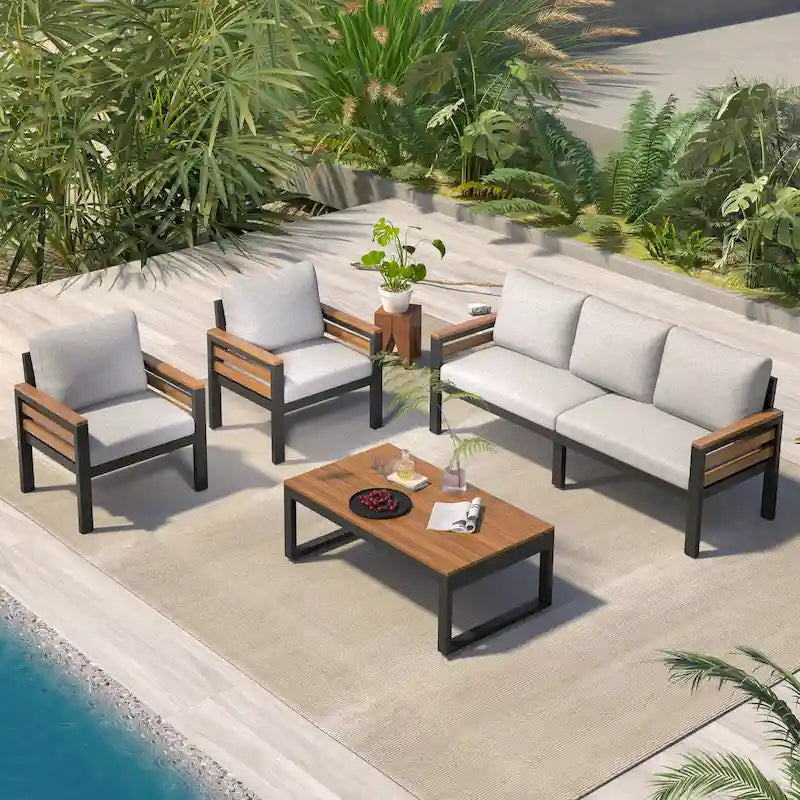 Ensemble de canapé d'extérieur en fer 4 pièces avec table basse en bois et coussins