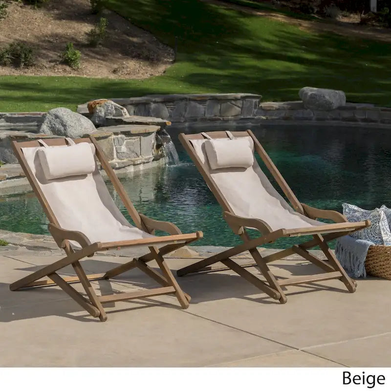 Chaises longues pliantes d'extérieur Nikki en bois d'eucalyptus et toile (lot de 2) par Christopher Knight Home