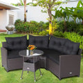 Ensemble de meubles de patio en rotin Costway 4 pièces avec coussins et table en verre - 49,5 x 23 x 29