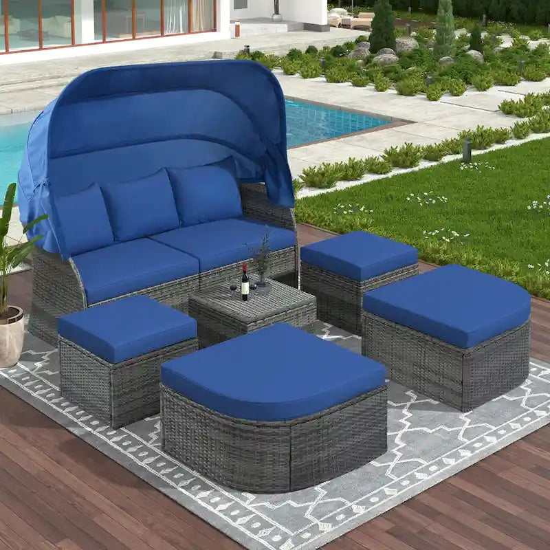 Bain de soleil d'extérieur en osier gris avec coussins et auvent rétractable