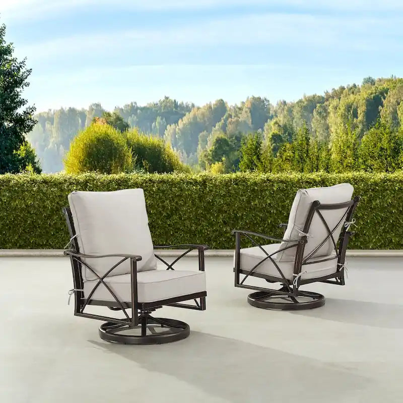 Paire de fauteuils de club pivotants à bascule en aluminium noir avec coussins